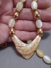 Napier champagne moonglow lucite bead necklace w/Chevron enamel pendant 24″