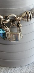 Vintage Avon Multiple Charm Silvertone Stretchable Locket Bracelet 8+