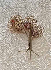 Vintage filigree flower gold tone metal