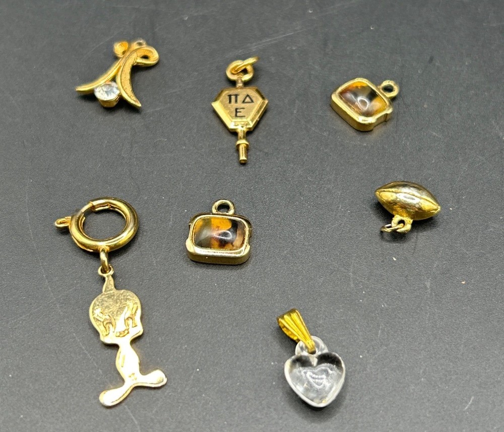 Vintage Gold-Toned Charm Lot (7) – Mixed Metal & Shapes Pre-Owned