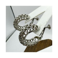 Vintage silver tone chunky hoop earrings with open cut outs hinged clip on