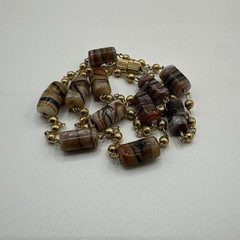 Vintage Glass Beads and Gold Tone Necklace. It’s 18” long. See pics.