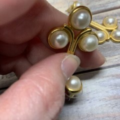 Pierced faux pearl cabochon dangle earrings in gold tone metal