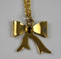 Vintage Gold Tone Necklace & Bow Shaped Pendant with Red Rhinestone