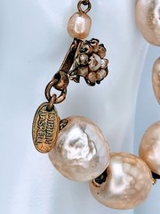 Miriam Haskell statement necklace featuring oversized faux baroque pearls.