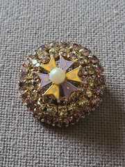 Brooch/pendant in lavender & yellow prong set rhinestones. Dome shape. Vintage