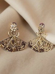 Costume jewelry earrings titled ‘Spider Rhinestone Earrings’ by Piper K