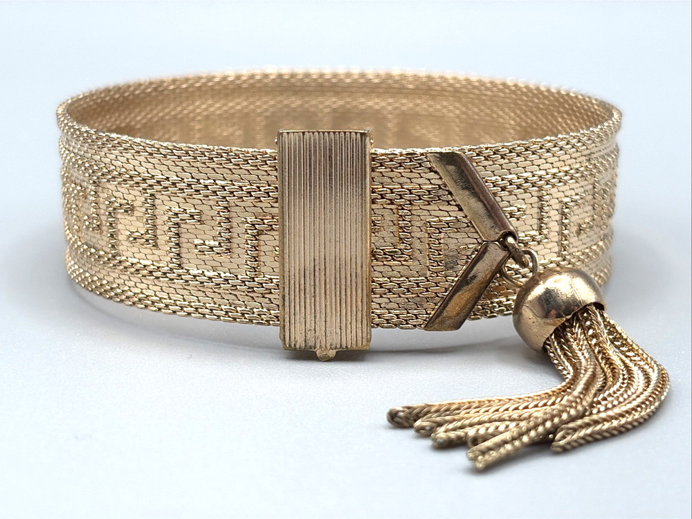 Vintage MCM Greek Key Gold Tone Mesh Slide Bracelet w/ Tassel