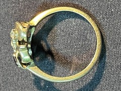 Ringcraft ring is crafted from 14k yellow gold/diamond and sapphire accents