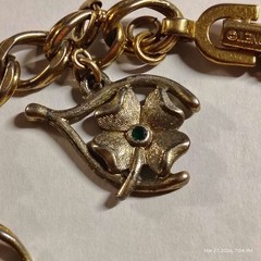 VINTAGE MONET GOLD TONE BRACELET WITH 6 CHARMS AND SAFETY CHAIN 4 leaf clover