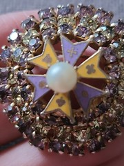 Brooch/pendant in lavender & yellow prong set rhinestones. Dome shape. Vintage