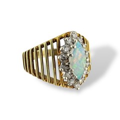 Vintage circa 1970s 14k Yellow Gold Marquise Opal Ring with Diamond Halo