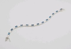 Sterling Silver 3.25ct Blue Topaz Matte Finished Bone Link Tennis Bracelet 7.5″