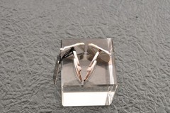 Near mint, gold and Cufflinks and silver tie clip, “Yves Saint Laurent”, case.