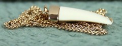 Unsigned Vintage Avon Adventure Pendant Neck Chain Necklace Faux Ivory Tooth