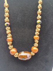 Glass Bead Necklace On Knotted Rope.