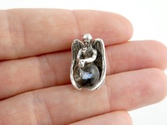 Vintage Unmarked Sterling Silver Angel Holding Opal in Resin Pendant 6.5g .75 In