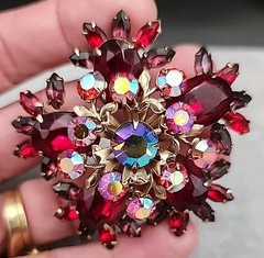 Vintage gold-toned Brooch featuring Ruby Red Navette and round Aurora Borealis