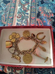 1950’s Charm Bracelet 11 Charm Heavy Gold Tone Good Condition