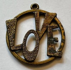 VINTAGE LOVE WORD PENDANT BRASS 1960s 2″ STAIN ON RIGHT SIDE RETRO