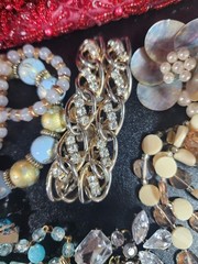 Vintage jewelry set of 26 in vintage purse