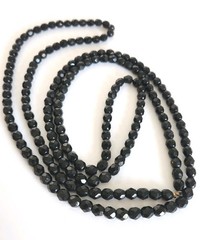 Black faceted beaded necklace. Long! 26″ long.