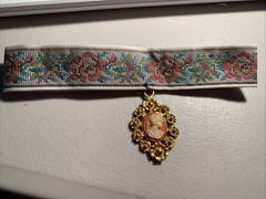 Vintage Ladies cloth choker necklace faux Coral and Ivory in gold-tone pendant