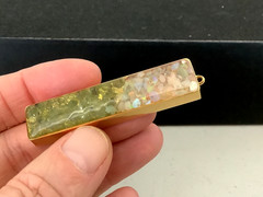 Vintage gold plated genuine Opal Peridot nuggets in resin bar pendant 0.5” x 2”