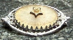 Antique Art Deco Camphor Glass and Silver Tone Metal Pin with Center Stone