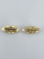Vintage Swank mens cufflinks torpedo shaped raised cutout design gold tone 3/4″