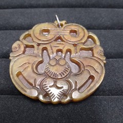 Brown Stone Carved Pendant Silver Tone