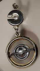 VTG & antique Hickok swivel fob pendant. It features a gold-toned outer ring