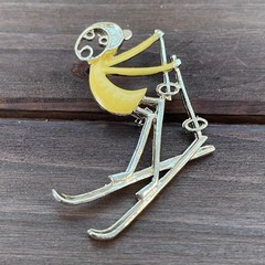 Vintage Ski Pin Falling Skier Gold Tone Yellow Enamel Cartoon Style R.N. Koch
