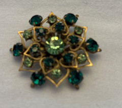 Set a four mid-century small brooches. Some serious costume bling here.