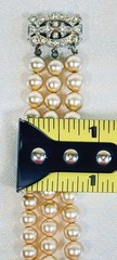 Vintage Triple Strand Faux Pearl Bracelet With Fancy Rhinestone Clasp 6.5”