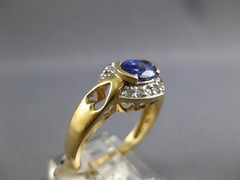 ESTATE .92CT DIAMOND & AAA TANZANITE 14KT YELLOW GOLD 3D OVAL & ROUND FUN RING