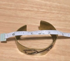vintage mixed-metal cuff bracelet featuring S spiral design from 1950s-1970s.