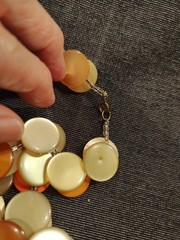 Groovy 52″ Yellow Orange Plastic Button Necklace Swinging 60-70s Possibly Lucite