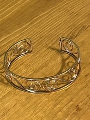 Krementz scroll work cuff spiral design on gold tone open back 6” 1950-60s