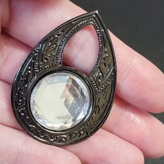 Dark silver tone rhinestone teardrop shaped brooch