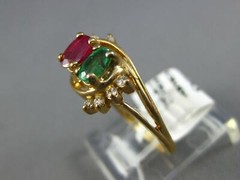 .70CT DIAMOND & AAA EMERALD & RUBY 14K YELLOW GOLD OVAL & ROUND CRISS CROSS RING