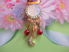 Aurora Moon Face Brooch Pin Enamel Hat Rhinestone Red Jingle Bells NEW