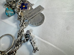 Sterling Silver Bell Trading Vintage link charm bracelet with 25 various charms