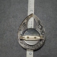 Dark silver tone rhinestone teardrop shaped brooch