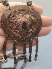 A set of tribal-style wooden and metal jewelry pendant necklace 26in Earrings.