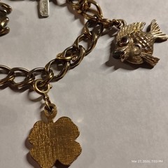 VINTAGE MONET GOLD TONE BRACELET WITH 6 CHARMS AND SAFETY CHAIN 4 leaf clover