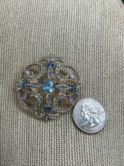 Pretty 1.82″ Gold tone metal blue and clear stone brooch