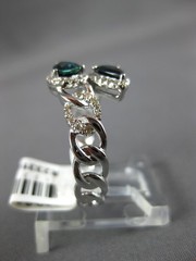 .99CT DIAMOND & AAA SAPPHIRE 14KT WHITE GOLD PEAR SHAPE & ROUND CRISS CROSS RING