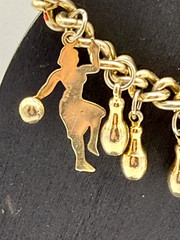 Vintage Gold Tone Women’s Bowling Charm Bracelet. 6.25in 15.9cm Fold Over Clasp