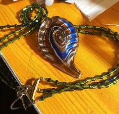 Vintage Paisley Peacock Glass Pendant on Iridescent green glass necklace 18 inch